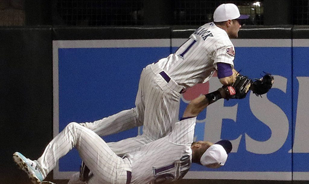 D-backs' Chris Owings exits game after collision with A.J. Pollock