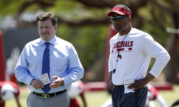 Arizona Cardinals NFL football team president Michael Bidwill, left, and head coach Steve Wilks wat...
