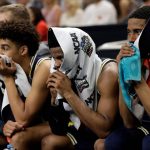 Players on the Michigan bench watch during the second half in the championship game of the Final Four NCAA college basketball tournament against Villanova, Monday, April 2, 2018, in San Antonio. (AP Photo/Eric Gay)