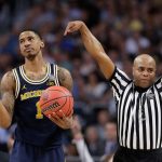 Michigan's Charles Matthews (1) reacts to a foul call during the second half in the championship game of the Final Four NCAA college basketball tournament against Villanova, Monday, April 2, 2018, in San Antonio. (AP Photo/Eric Gay)