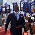 Broadcast analyst and Hall of Famer Michael Irvin walks the red carpet before the first round of the NFL football draft, Thursday, April 26, 2018, in Arlington, Texas. (AP Photo/Eric Gay)