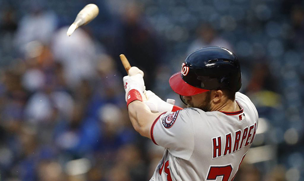 Washington Nationals' Bryce Harper hits a solo home run in the first inning of a baseball game agai...