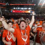 Cleveland Browns fans react to Ohio State's Denzel Ward being selected by their team during the first round of the NFL football draft, Thursday, April 26, 2018, in Arlington, Texas. (AP Photo/Michael Ainsworth)