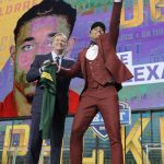 Louisville's Jaire Alexander, right, celebrates next to commissioner Roger Goodell after being picked by the Green Bay Packers during the first round of the NFL football draft, Thursday, April 26, 2018, in Arlington, Texas. (AP Photo/David J. Phillip)