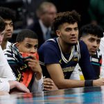 Players on the Michigan bench react as they watch during the second half in the championship game of the Final Four NCAA college basketball tournament against Villanova, Monday, April 2, 2018, in San Antonio. (AP Photo/David J. Phillip)