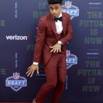 Louisville's Jaire Alexander poses for photos on the red carpet before the first round of the NFL football draft, Thursday, April 26, 2018, in Arlington, Texas. (AP Photo/Eric Gay)
