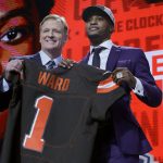 Ohio State's Denzel Ward, right, poses with Commissioner Roger Goodell after being selected by the Cleveland Browns during the first round of the NFL football draft, Thursday, April 26, 2018, in Arlington, Texas. (AP Photo/David J. Phillip)