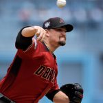 Arizona Diamondbacks starting pitcher Zack Godley throws to the plate during the first inning of a baseball game against the Los Angeles Dodgers Sunday, April 15, 2018, in Los Angeles. (AP Photo/Mark J. Terrill)