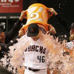 Arizona Diamondbacks Zack Godley, left, and Archie Bradley pour Gatorade over Patrick Corbin (46) after defeating the San Francisco Giants 1-0 during a baseball game, Tuesday, April 17, 2018, in Phoenix. Corbin pitched a complete game, one hit shut-out. i(AP Photo/Rick Scuteri)