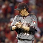 Arizona Diamondbacks relief pitcher Yoshihisa Hirano rubs up a new ball during the seventh inning of a baseball game against the St. Louis Cardinals, Thursday, April 5, 2018, in St. Louis. (AP Photo/Jeff Roberson)
