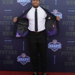 North Carolina State's Bradley Chubb poses for photos on the red carpet before the first round of the NFL football draft, Thursday, April 26, 2018, in Arlington, Texas. (AP Photo/Eric Gay)