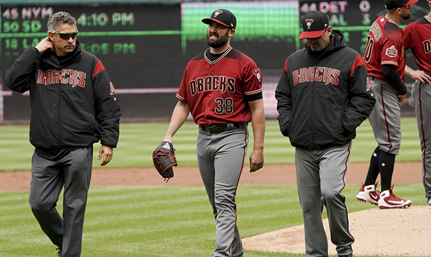 Arizona Diamondbacks starting pitcher Robbie Ray (38) leaves the game during the second inning of a...