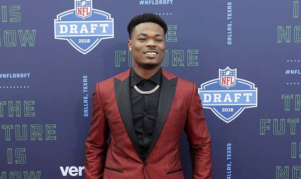 Florida State's Derwin James poses for photos on the red carpet before the first round of the NFL f...