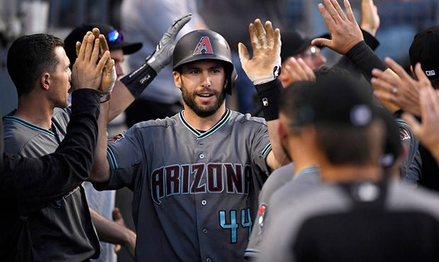 Arizona Diamondbacks' Paul Goldschmidt is congratulated after hitting a two-run home run during the...