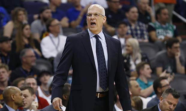 Phoenix Suns head coach Jay Triano shouts at an official during the first half of an NBA basketball...