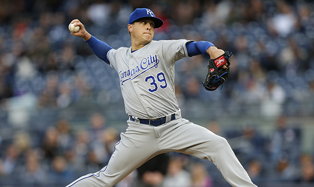 Kansas City Royals starting pitcher Kris Medlen (39) delivers during the first inning of a baseball...