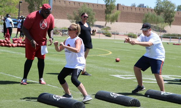 Coaches at the Arizona Cardinals youth football camp taught both the high school participants and t...