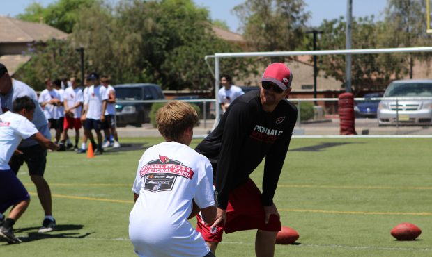Former ASU and NFL quarterback Rudy Carpenter coached his first Arizona Cardinals youth camp on Sat...