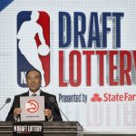 NBA Deputy Commissioner Mark Tatum announces that the Atlanta Hawks won the third pick during the NBA basketball draft lottery Tuesday, May 15, 2018, in Chicago. (AP Photo/Charles Rex Arbogast)
