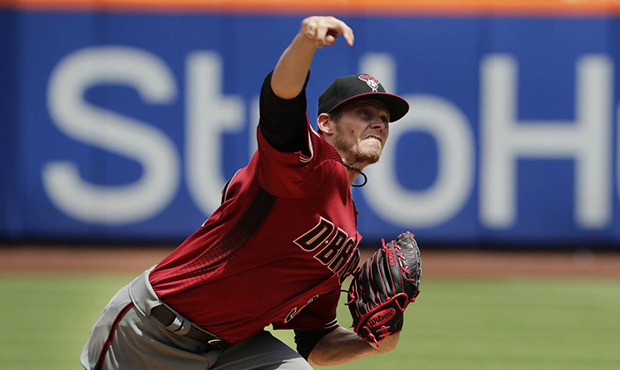 Arizona Diamondbacks' Clay Buchholz delivers a pitch during the first inning of a baseball game aga...