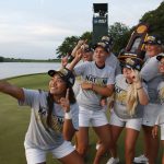 Arizona players pose for a selfie with the trophy after defeating Alabama during the final round of the NCAA Division I women's golf championship in Stillwater, Okla., Wednesday, May 23, 2018. (AP Photo/Sue Ogrocki)