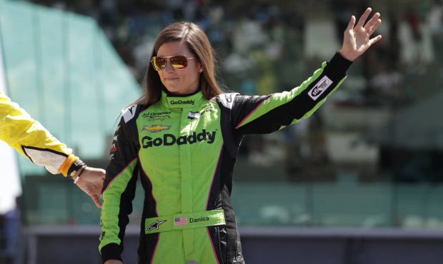 Danica Patrick waves as she's introduced before the start of the Indianapolis 500 auto race at Indi...