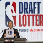 NBA Deputy Commissioner Mark Tatum announces that the Dallas Mavericks had won the fifth pick during the NBA basketball draft lottery Tuesday, May 15, 2018, in Chicago. (AP Photo/Charles Rex Arbogast)