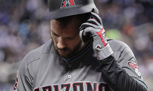 Arizona Diamondbacks' Steven Souza Jr. pulls off his batting helmet after striking out against the ...