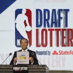 NBA Deputy Commissioner Mark Tatum announces that the Denver Nuggets won the 14th pick during the NBA basketball draft lottery Tuesday, May 15, 2018, in Chicago. (AP Photo/Charles Rex Arbogast)