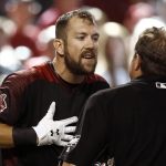 Arizona Diamondbacks' Steven Souza Jr., left, argues with umpire Doug Eddings, right, after Souza was thrown out of the baseball game for throwing his bat after a third strike during the eighth inning against the Washington Nationals Saturday, May 12, 2018, in Phoenix. The Nationals defeated the Diamondbacks 2-1. (AP Photo/Ross D. Franklin)