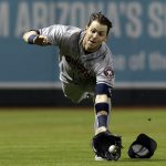 Houston Astros right fielder Josh Reddick makes the diving catch for the out on a ball hit by Arizona Diamondbacks' Daniel Descalso during the sixth inning during a baseball game Friday, May 4, 2018, in Phoenix. (AP Photo/Rick Scuteri)