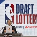 NBA Deputy Commissioner Mark Tatum announces that the Cleveland Cavaliers won the eighth pick during the NBA basketball draft lottery Tuesday, May 15, 2018, in Chicago. (AP Photo/Charles Rex Arbogast)