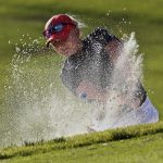 Arizona's Sandra Nordaas hits out of a bunker onto the 16th green during the final round of the NCAA Division I women's golf championship in Stillwater, Okla., Wednesday, May 23, 2018. Arizona defeated Alabama for the title. (AP Photo/Sue Ogrocki)
