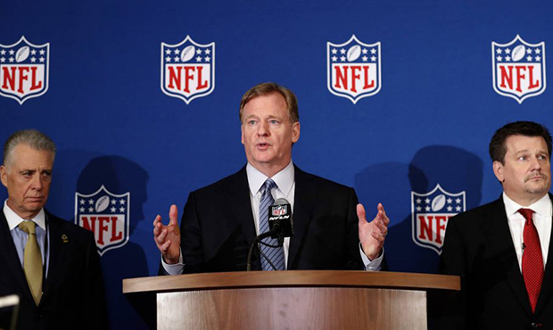 NFL commissioner Roger Goodell, center, is flanked by Pittsburgh Steelers president Art Rooney II, ...