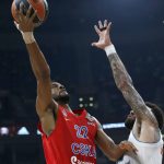 CSKA Moscow's Cory Higgins, left, tries to score as Real Madrid's Jeffery Taylor blocks him during their Final Four Euroleague semifinal basketball match in Belgrade, Serbia, Friday, May 18, 2018. (AP Photo/Darko Vojinovic)