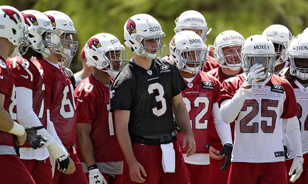 Arizona Cardinals' first-round draft pick Josh Rosen (3) stands with his teammates during NFL footb...