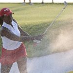 Alabama's Lakareber Abe hits out of a bunker onto the 18th green during a playoff in the final round of the NCAA Division I women's golf championship in Stillwater, Okla., Wednesday, May 23, 2018. Arizona defeated Alabama for the title. (AP Photo/Sue Ogrocki)