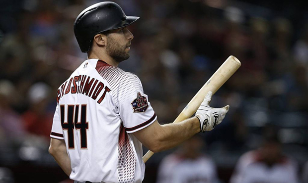 Arizona Diamondbacks' Paul Goldschmidt walks back to the dugout after striking out against the Milw...