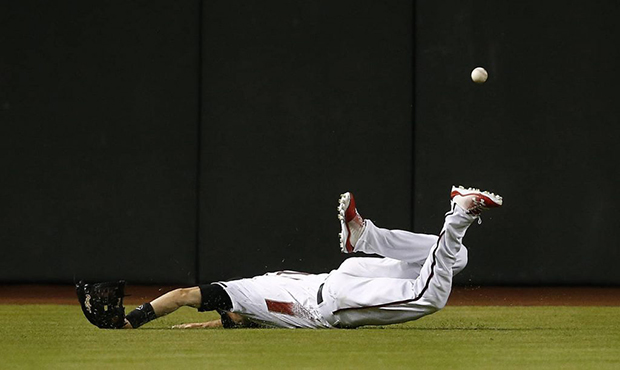 D-backs' Pollock has sprained left thumb after failed diving catch