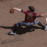 Arizona Diamondbacks starting pitcher Zack Godley throws during the first inning of a baseball game against the Milwaukee Brewers Wednesday, May 23, 2018, in Milwaukee. (AP Photo/Morry Gash)