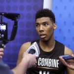 Allonzo Trier, from Arizona, talks to reporters during the NBA basketball draft combine Thursday, May 17, 2018, in Chicago. (AP Photo/Charles Rex Arbogast)
