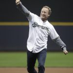 Milwaukee Bucks head coach Mike Budenholzer throws a ceremonial first pitch before a baseball game between the Milwaukee Brewers and the Arizona Diamondbacks Monday, May 21, 2018, in Milwaukee. (AP Photo/Morry Gash)