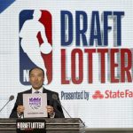 NBA Deputy Commissioner Mark Tatum announces that the Sacramento Kings had won the second pick during the NBA basketball draft lottery Tuesday, May 15, 2018, in Chicago. (AP Photo/Charles Rex Arbogast)