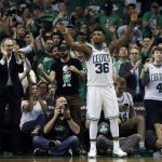 Boston Celtics guard Marcus Smart (36) celebrates near the end Game 5 against the Boston Celtics in the NBA basketball Eastern Conference finals Wednesday, May 23, 2018, in Boston. The Celtics won 96-83. (AP Photo/Charles Krupa)