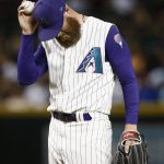 Arizona Diamondbacks relief pitcher Archie Bradley pauses on the mound after giving up a ball to allow a Washington Nationals run to score during the eighth inning of a baseball game Thursday, May 10, 2018, in Phoenix. The Nationals defeated the Diamondbacks 2-1. (AP Photo/Ross D. Franklin)