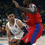 Real Madrid's Gustavo Ayon, left, drives to the basket as CSKA Moscow's Othello Hunter tries to block him during their Final Four Euroleague semifinal basketball match in Belgrade, Serbia, Friday, May 18, 2018. (AP Photo/Darko Vojinovic)