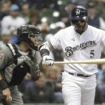 Milwaukee Brewers' Jonathan Villar reacts after striking out during the fifth inning of a baseball game against the Milwaukee Brewers Tuesday, May 22, 2018, in Milwaukee. (AP Photo/Morry Gash)