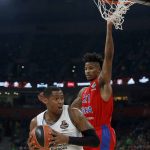 Real Madrid's Trey Thompkins, left, tries to score as CSKA Moscow's Will Clyburn blocks him during their Final Four Euroleague semifinal basketball match in Belgrade, Serbia, Friday, May 18, 2018. (AP Photo/Darko Vojinovic)