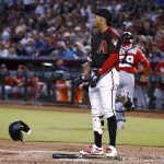 Arizona Diamondbacks shortstop Ketel Marte throws his helmet down after striking out against the Washington Nationals during the first inning of a baseball game Saturday, May 12, 2018, in Phoenix. (AP Photo/Ross D. Franklin)
