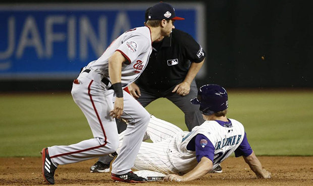 D-backs' Zack Greinke drives in first run of game, steals second after